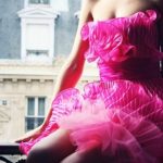 Girl in hot pink ruffle dress