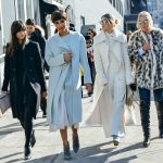 Outfit inspiration for Fall. Models walking down a street in winter outfits