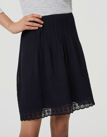 High-waisted daisy embroidered pin tuck black skirt
