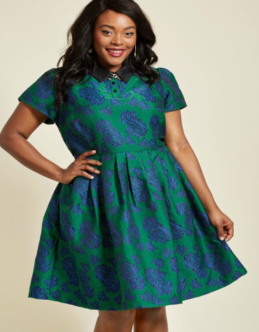 Blue and green patterned skater dress with black collar