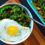 low carb breakfast bowl with eggs, tenderstem and quinoa
