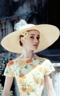 Audrey Hepburn semi formal style yellow sundress with flowers and wide rimmed hat - shop the look