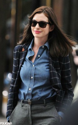Anne Hathaway street style blue shirt, dark trousers and navy blue blazer with stripes - shop the look