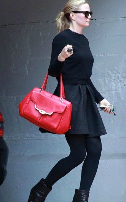 Jennifer Morrisonn street style, red handbag with black skirt, boots and polar neck
