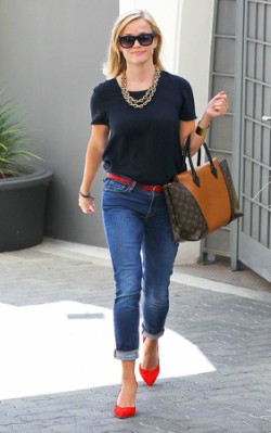 Reese Witherspoon street style polka dot blouse with red shoes and brown and black bag