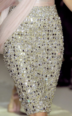 Fashion show model in sequined pencil skirt