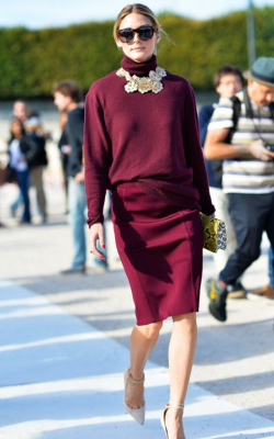 Olivia Palemero in burgundy pencil skirt and jumper