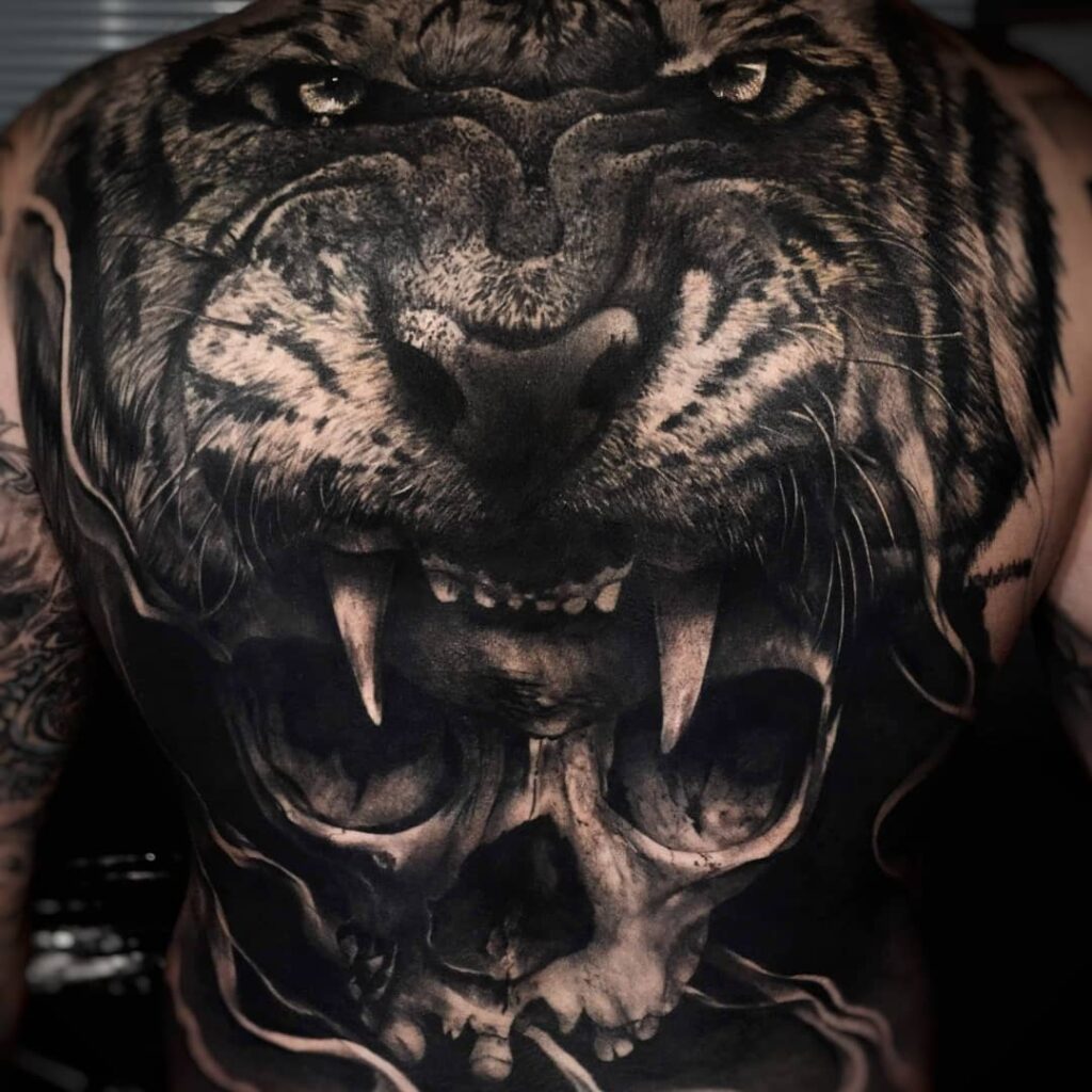 Skull Underneath A Tiger Face Back Tattoo