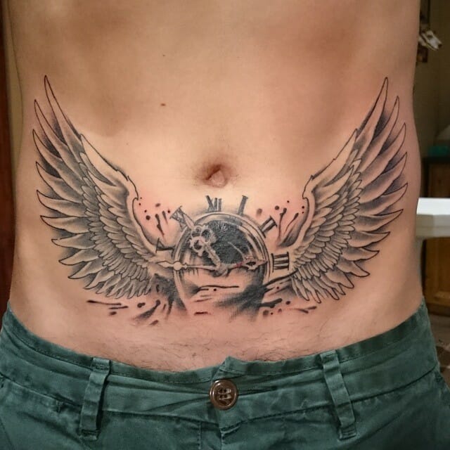 Winged Tattoo Below Chest