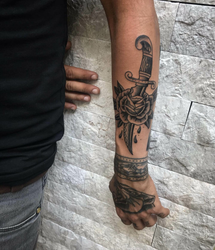 Black Rose And Dagger Tattoo
