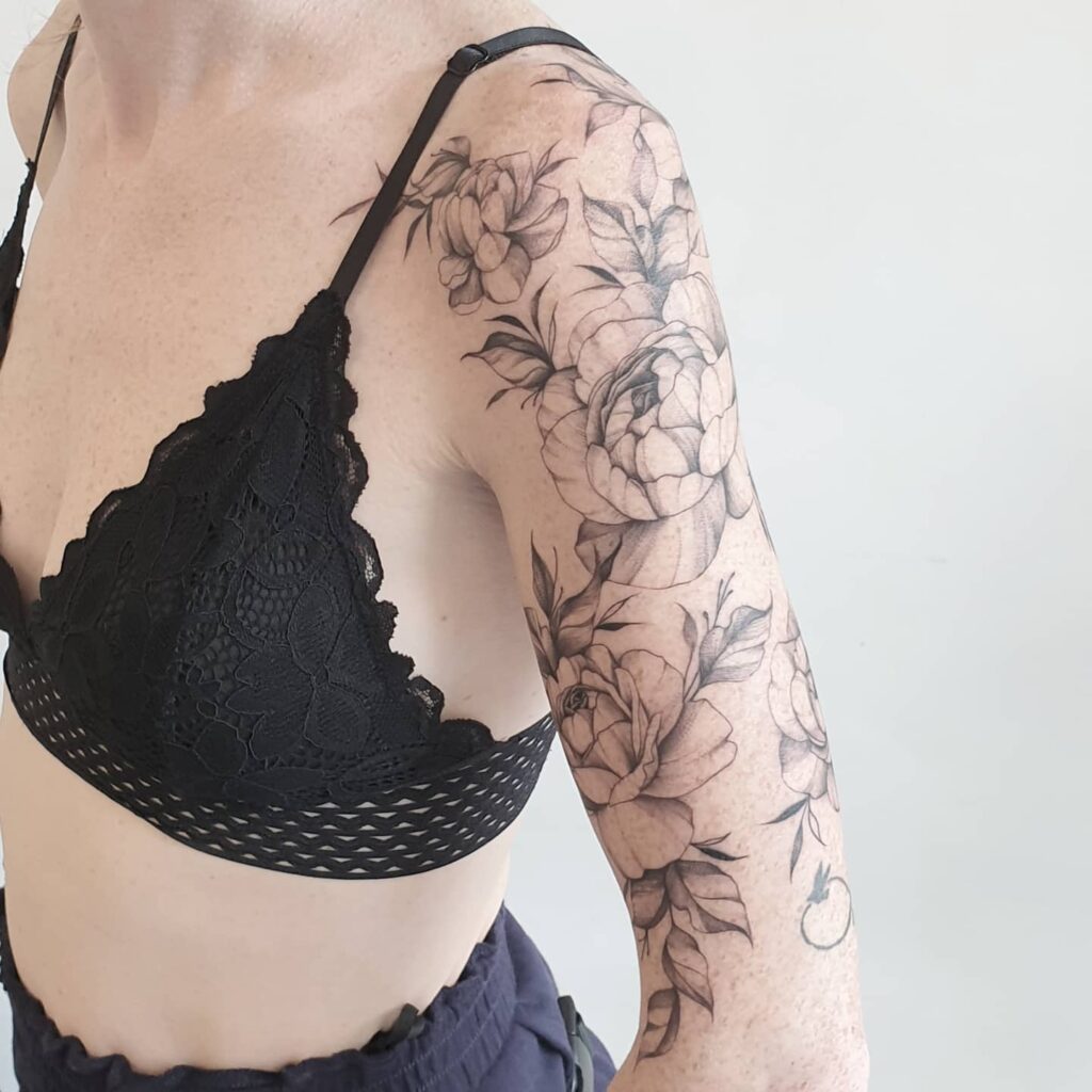 Flower Sleeve Tattoo Ideas Using Minimal Shading