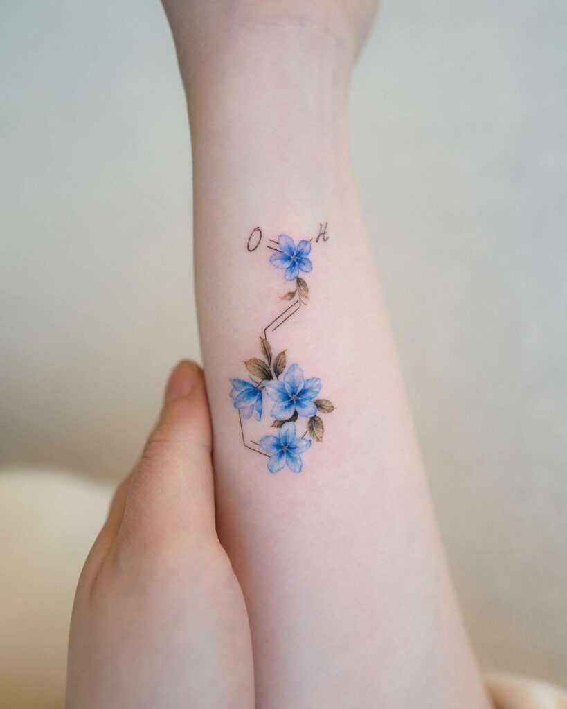 Larkspur Tattoos Embrace the Enchanting Beauty of Floral Art