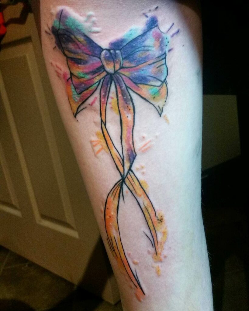 Watercolor Bow Tattoo On The Thigh