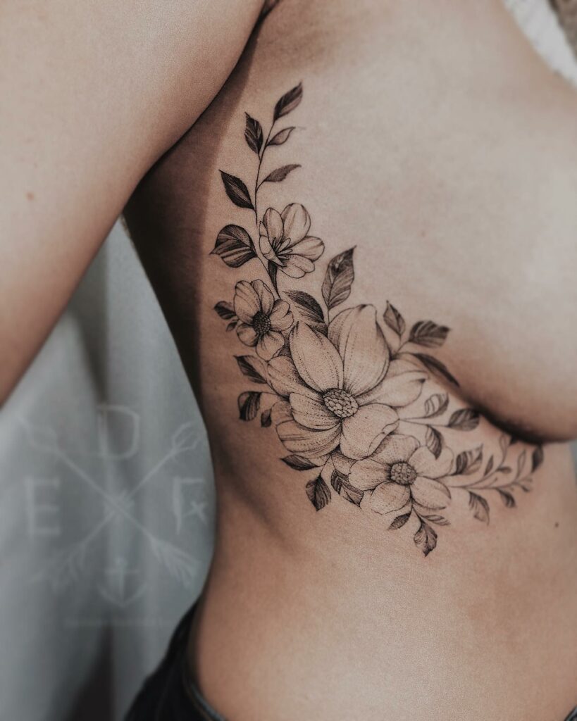 Long And Lean Flower Side Boob Tattoos