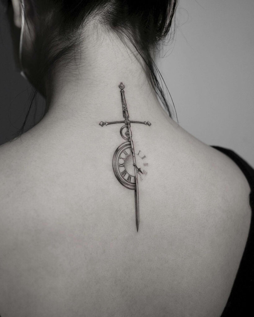 The Sword And The Watch Tattoo Of Power And Freedom