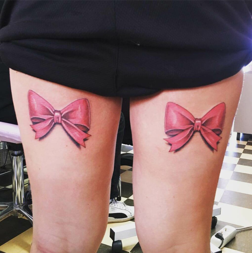 Simple Pink Bows Tattoo On Thighs