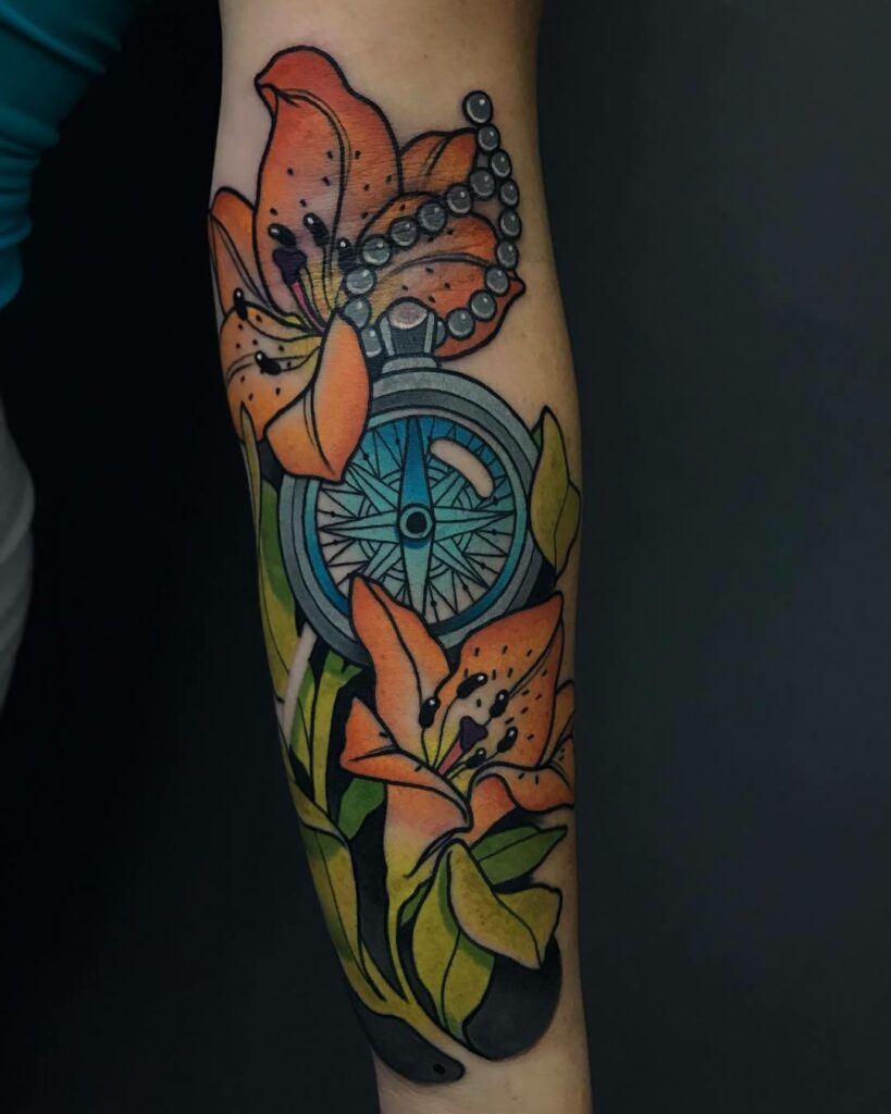 Floral Nautical Compass Tattoo On Elbow