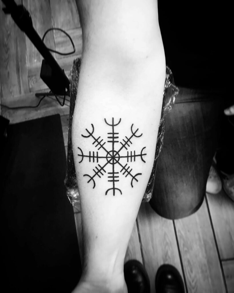 Female Strength Symbol Tattoo