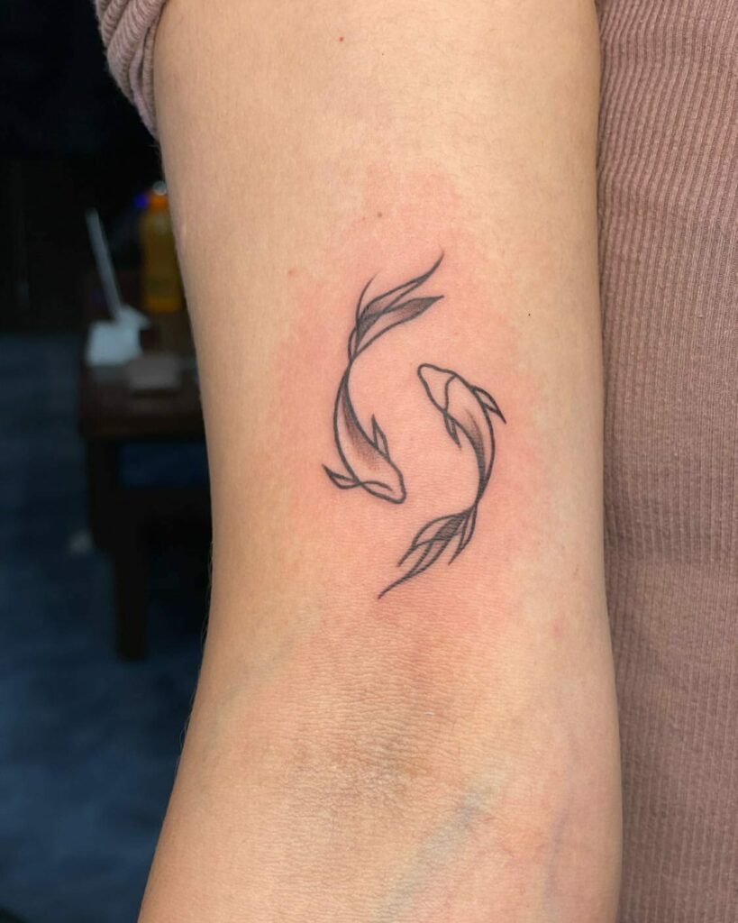 Female Strength Symbol Tattoo