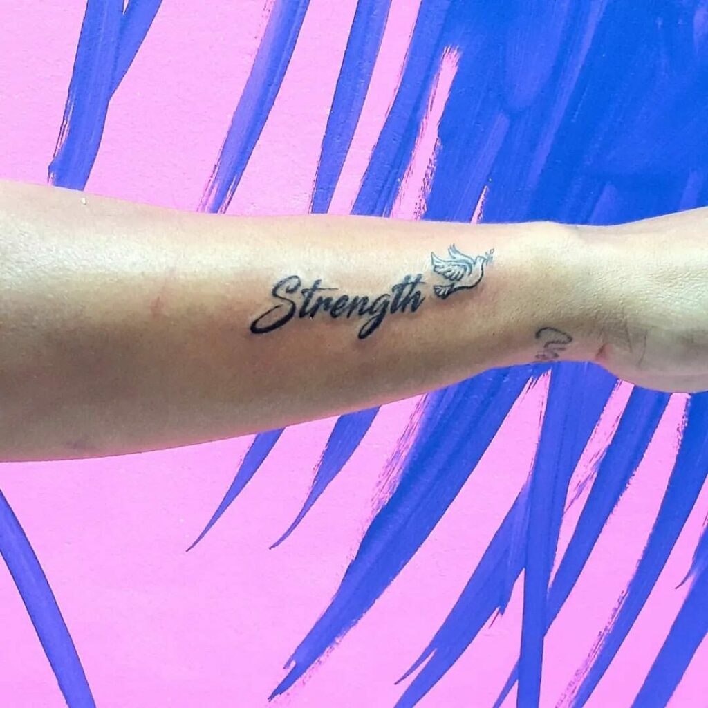 Female Strength Symbol Tattoo