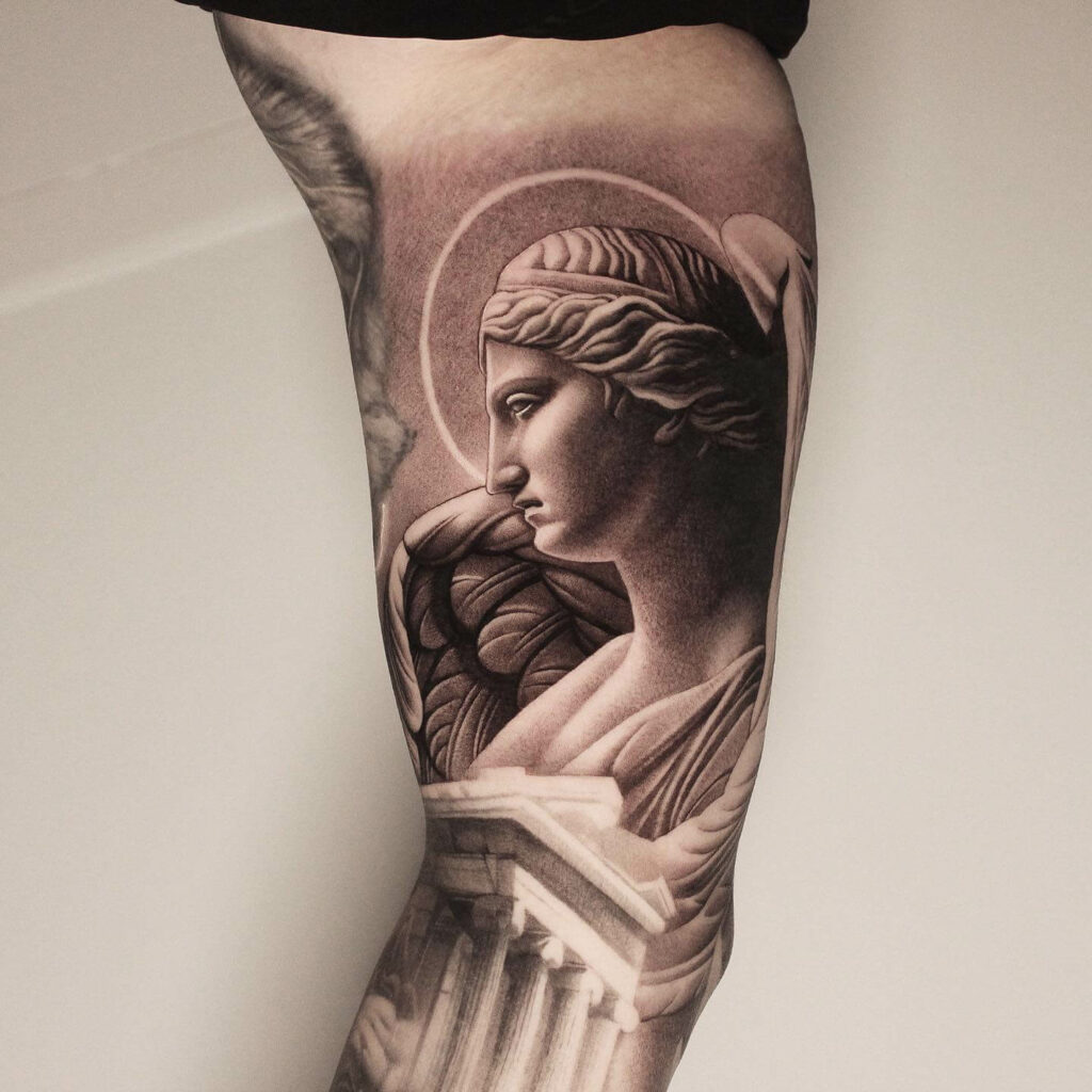 crying angel statue tattoo