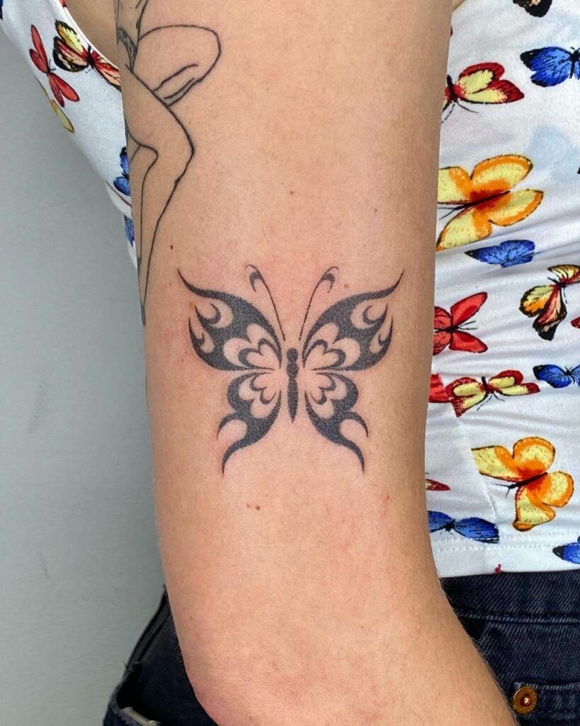 Simple Black Butterfly Hand Tattoo