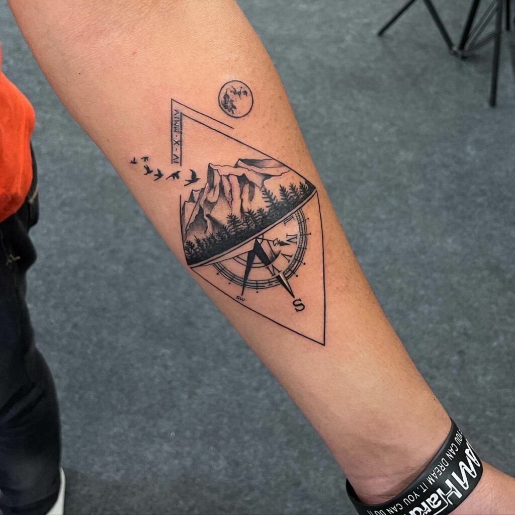 Premium Vector  Mountain map pointer and compass tattoo