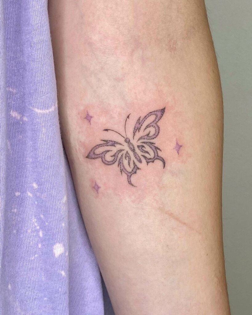 Fine Line Tribal Tattoo Of A Butterfly