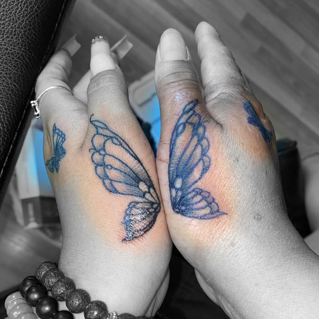 Blue Butterfly Wrist Tattoo