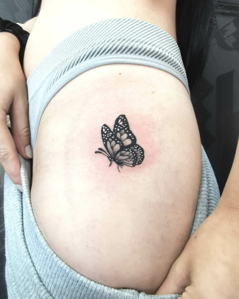 Minimalist Butterfly Tattoo On The Hip