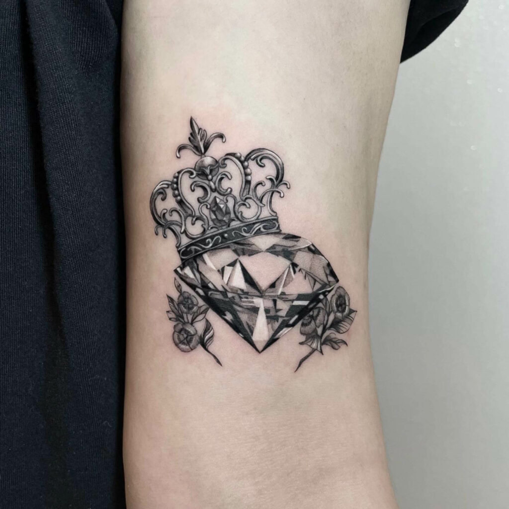 Floral-themed Diamond Hand Tattoo Design