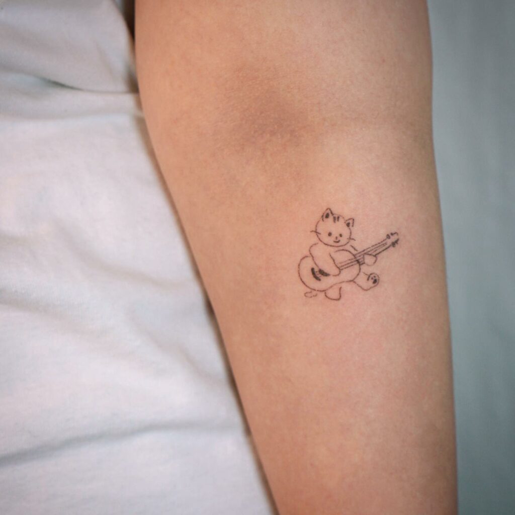 The Best Meaningful Small Guitar Tattoo