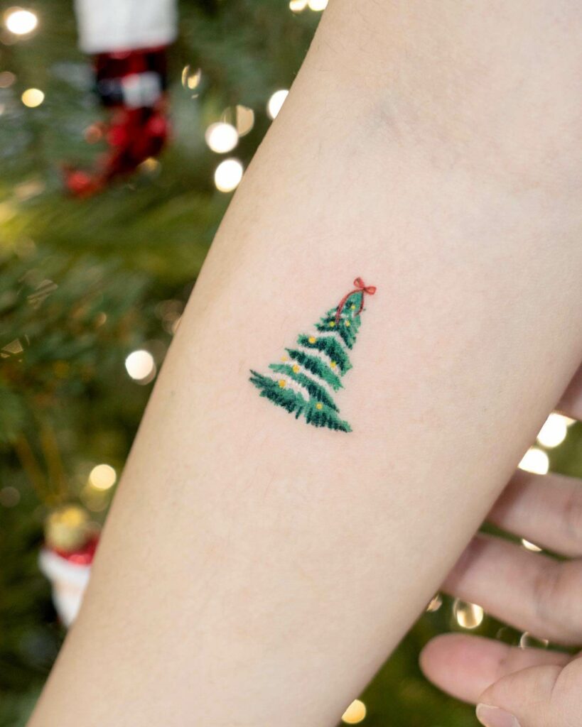 Adorable Small Christmas tree tattoo design