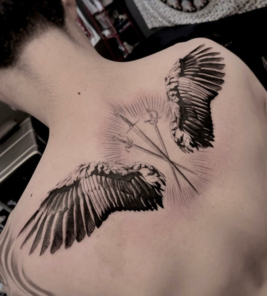 Fantastic Tattoo of Angel Wings on Shoulder Blade