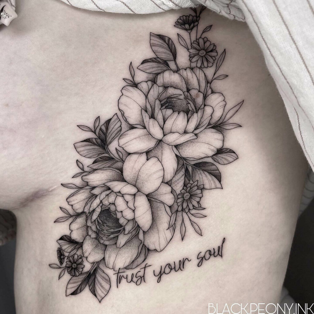 Side Boob Tattoo With Flowers And Quote