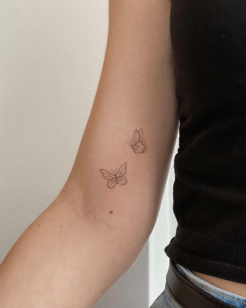Female Butterfly Forearm Tattoo