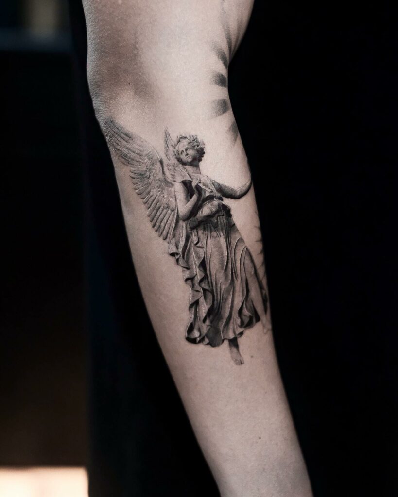 Traditional Angel Statue Tattoo Design