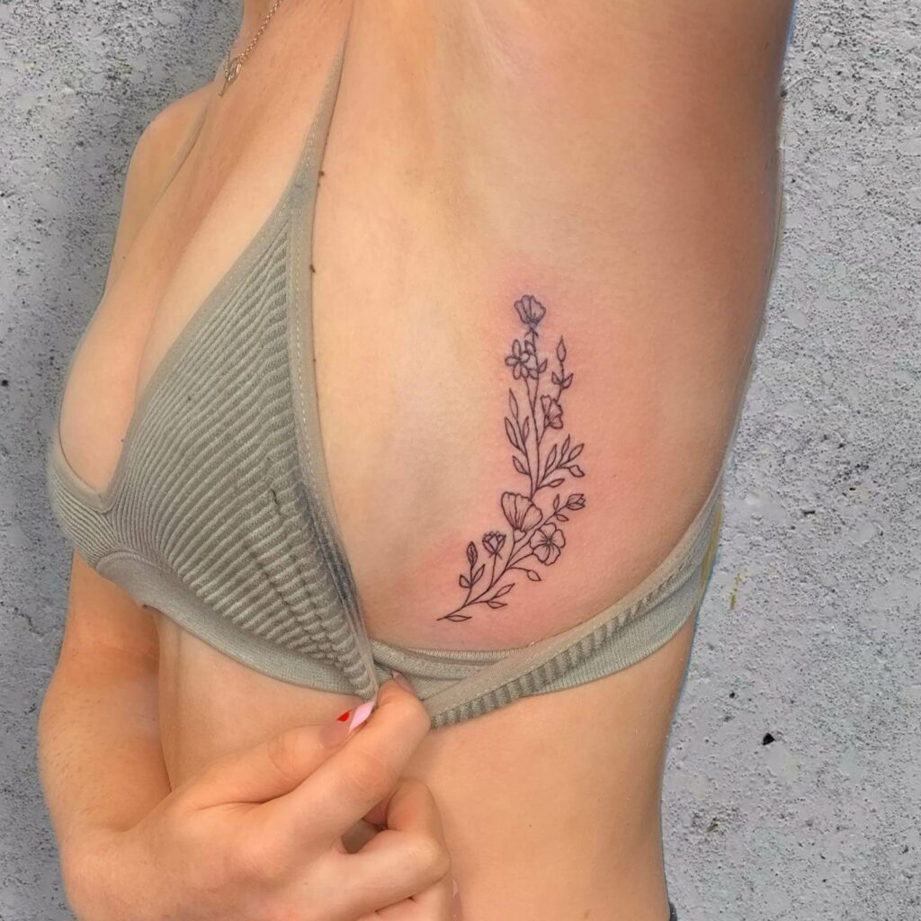 Fine Line Flower Side Boob Tattoos Ideas