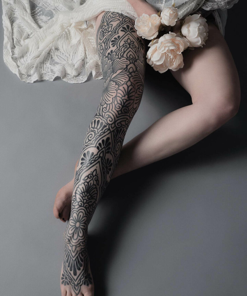 Ornamental Leg Sleeve Tattoos
