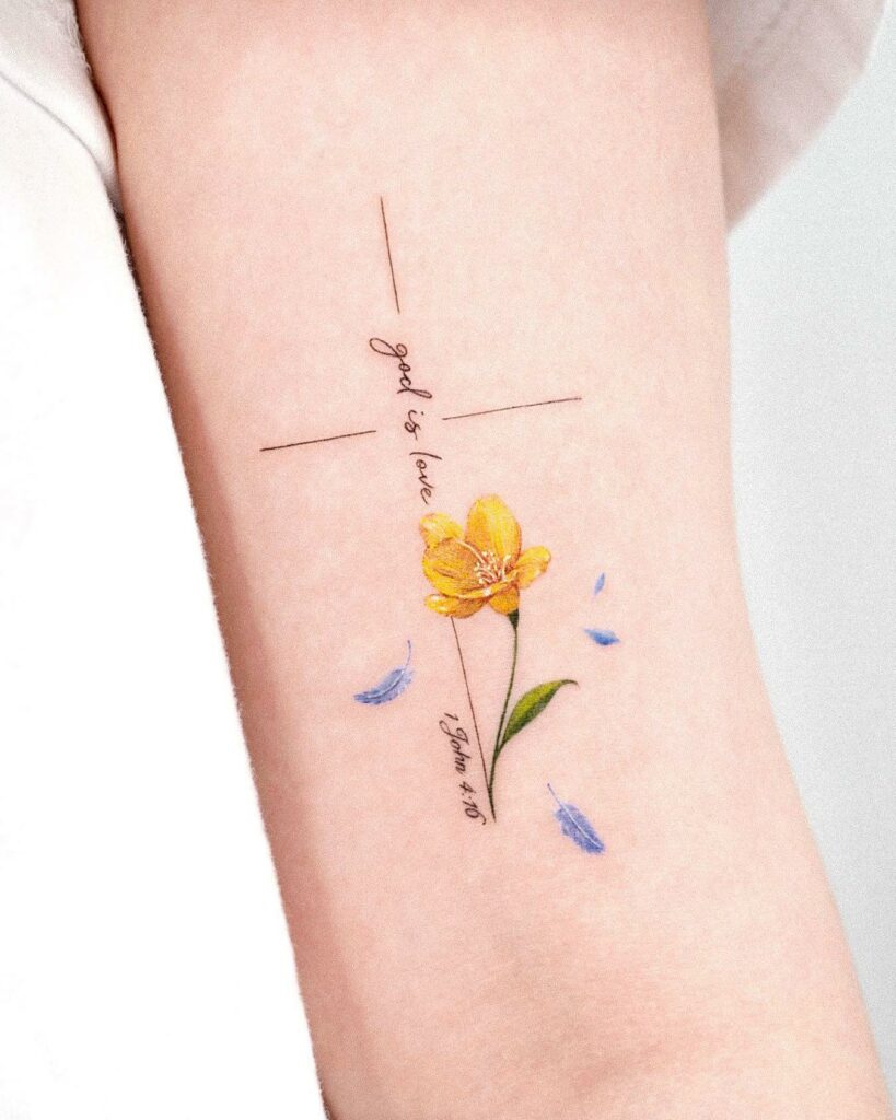 Cross With Yellow Flower Tattoo