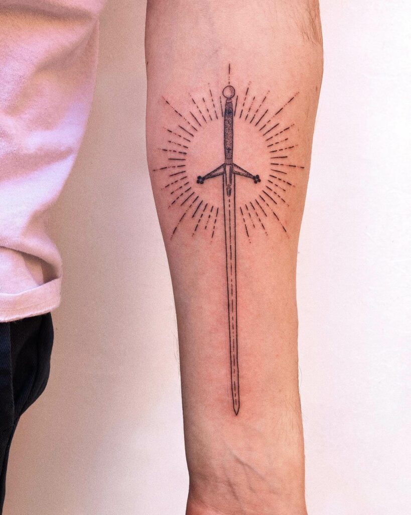 Sun And Sword Tattoo Design