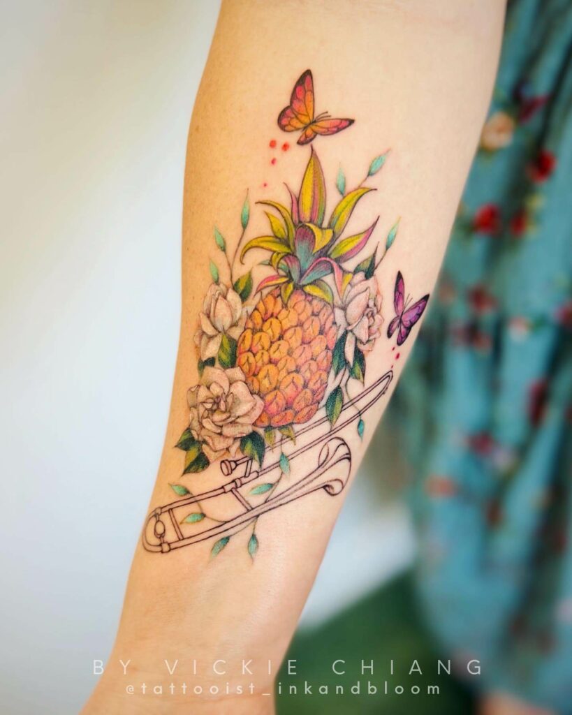 Colorful Pineapple Tattoo With Butterflies, Roses And Saxophone