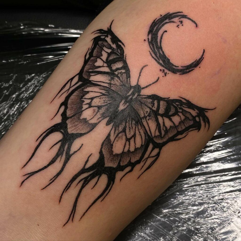 Big Dark Tribal Butterfly Tattoo