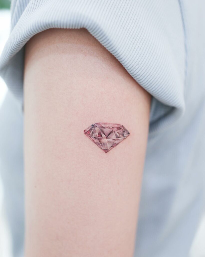 Tiny diamond tattoo done on the wrist minimalistic