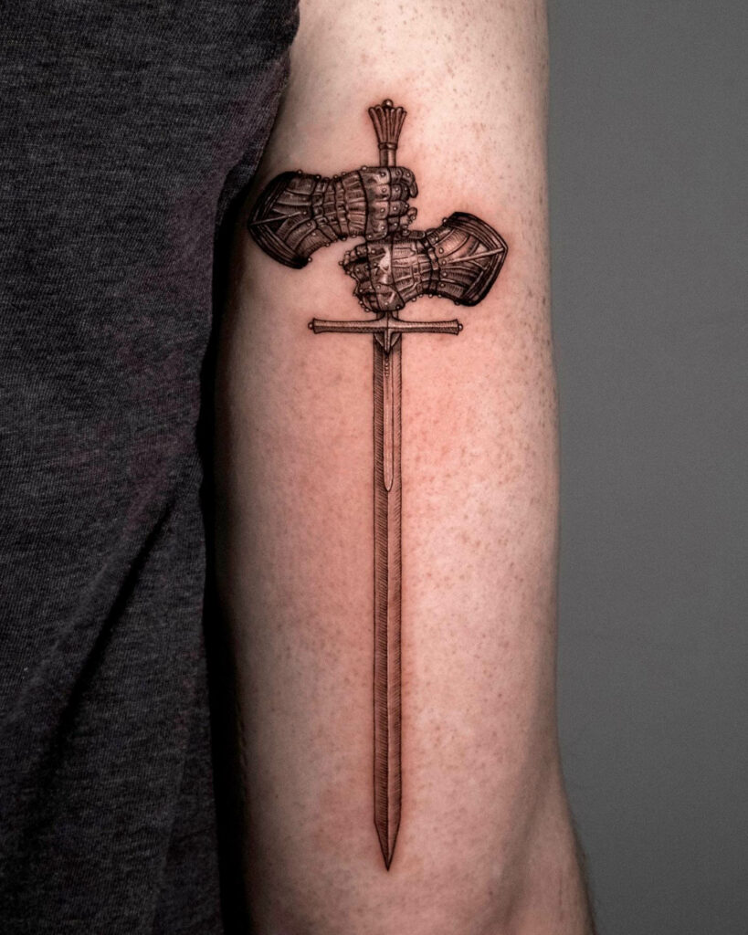 Armor Hands Holding Sword Tattoo
