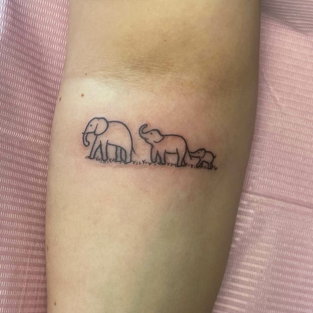 Baby Elephant With Heart Tattoo Design