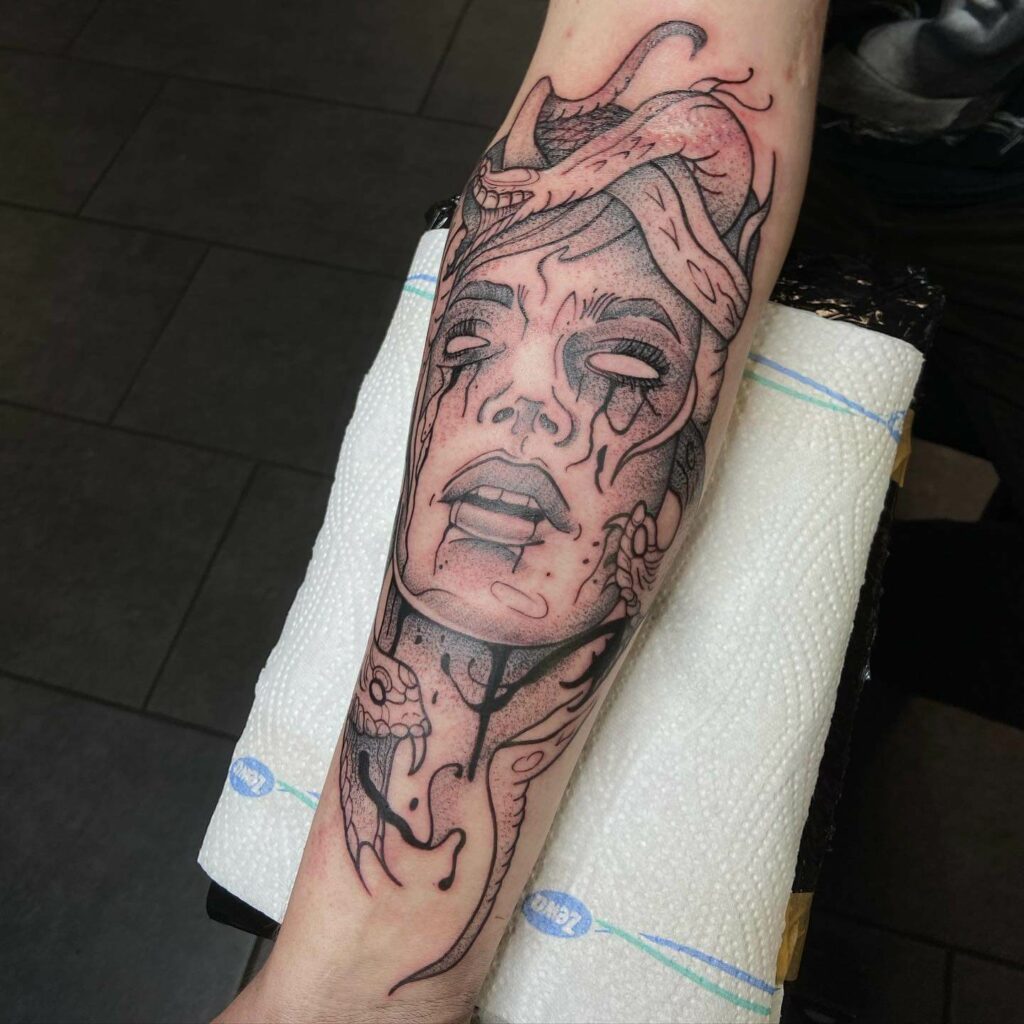 Realistic Black And Grey Medusa Stencil Tattoo