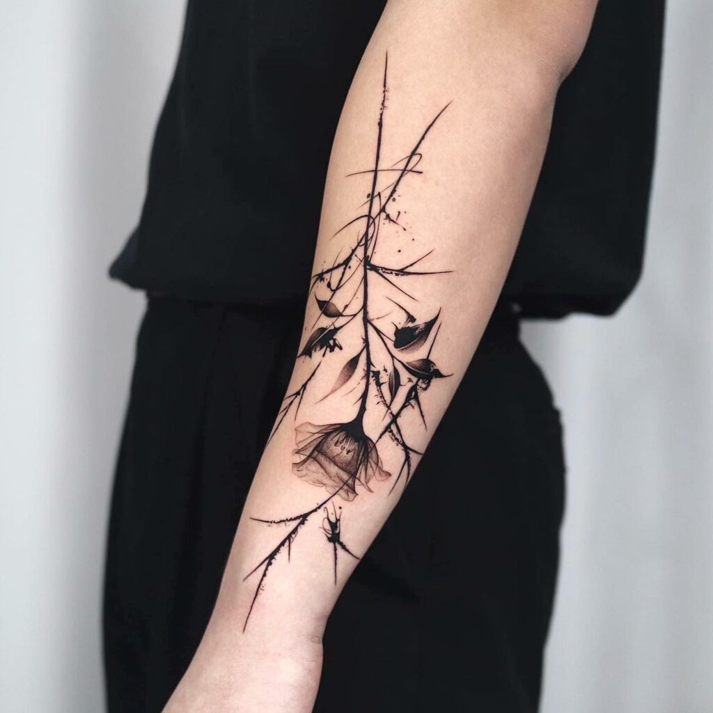 Unique Design Rose Having Thorns Hand Tattoo