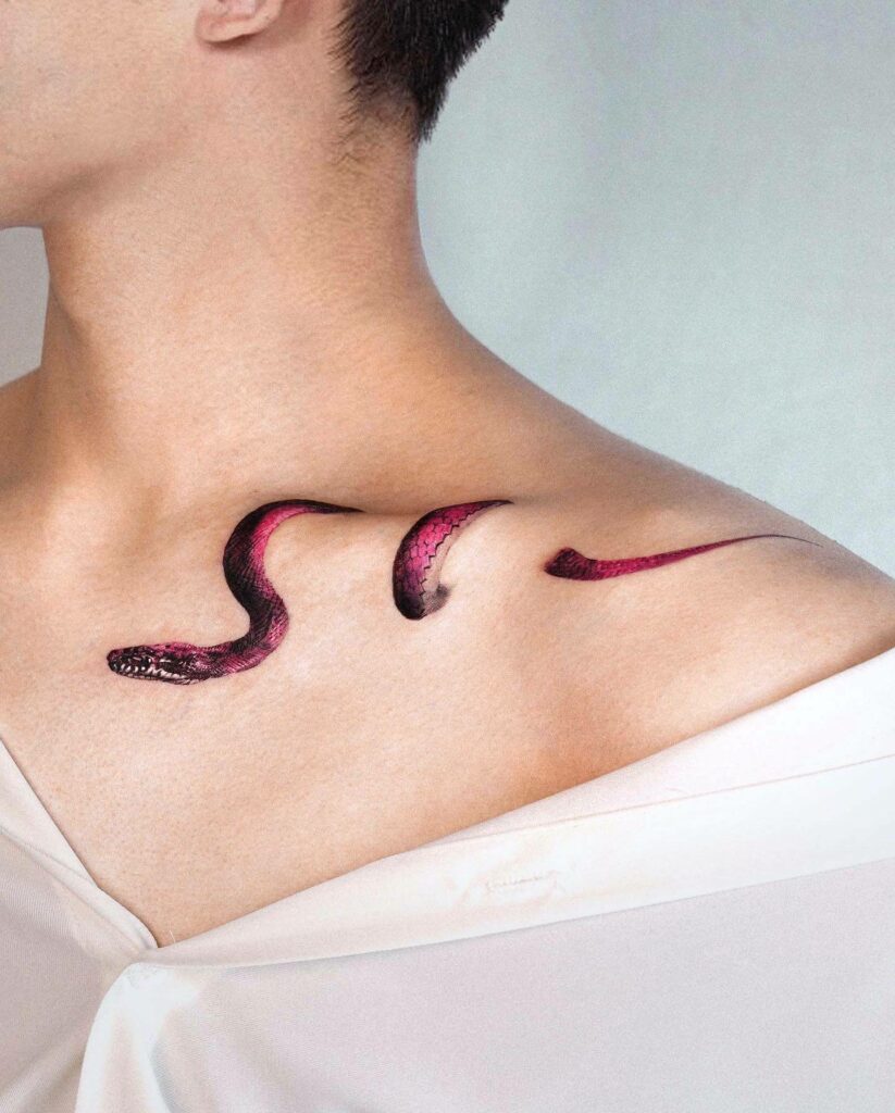 Snake collarbone tattoo