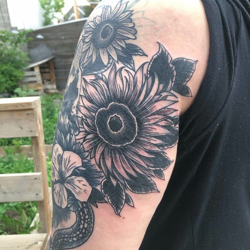 Traditional Black And Grey Ink Sunflower Shoulder Tattoo